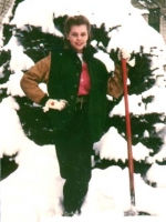 Polly shoveling snow