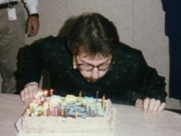 Norman blows out the candles